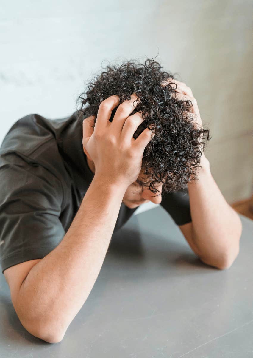 unhappy man avoiding failure and judgment