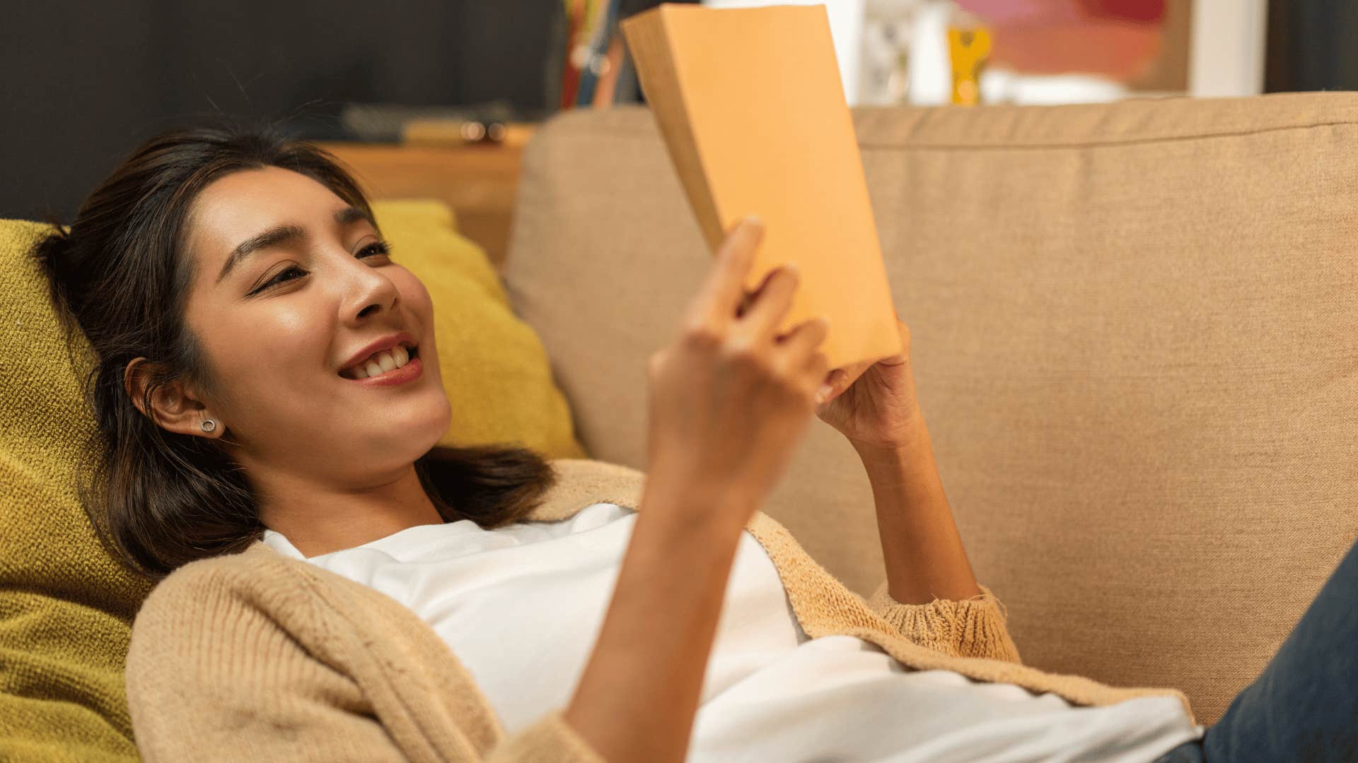 woman protecting her peace reading a book as a distraction