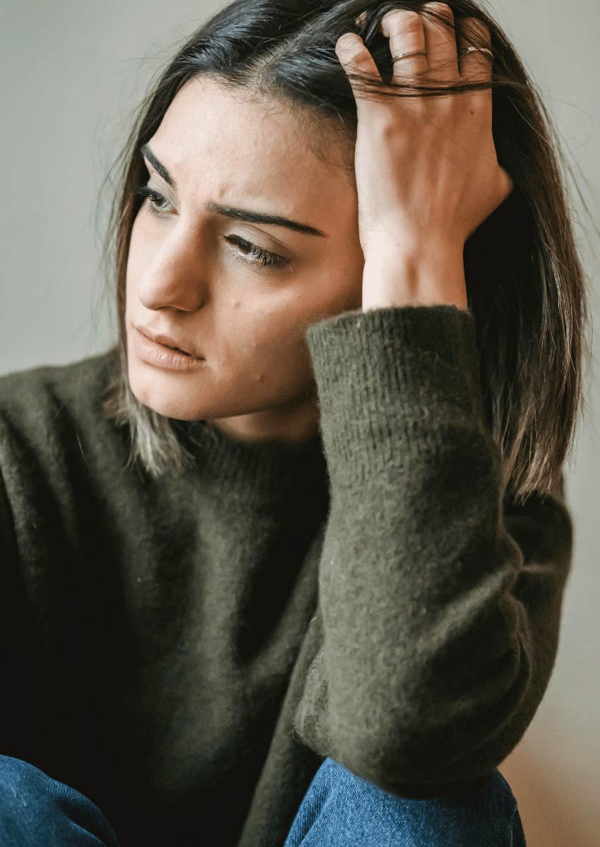woman debating revealing infidelity