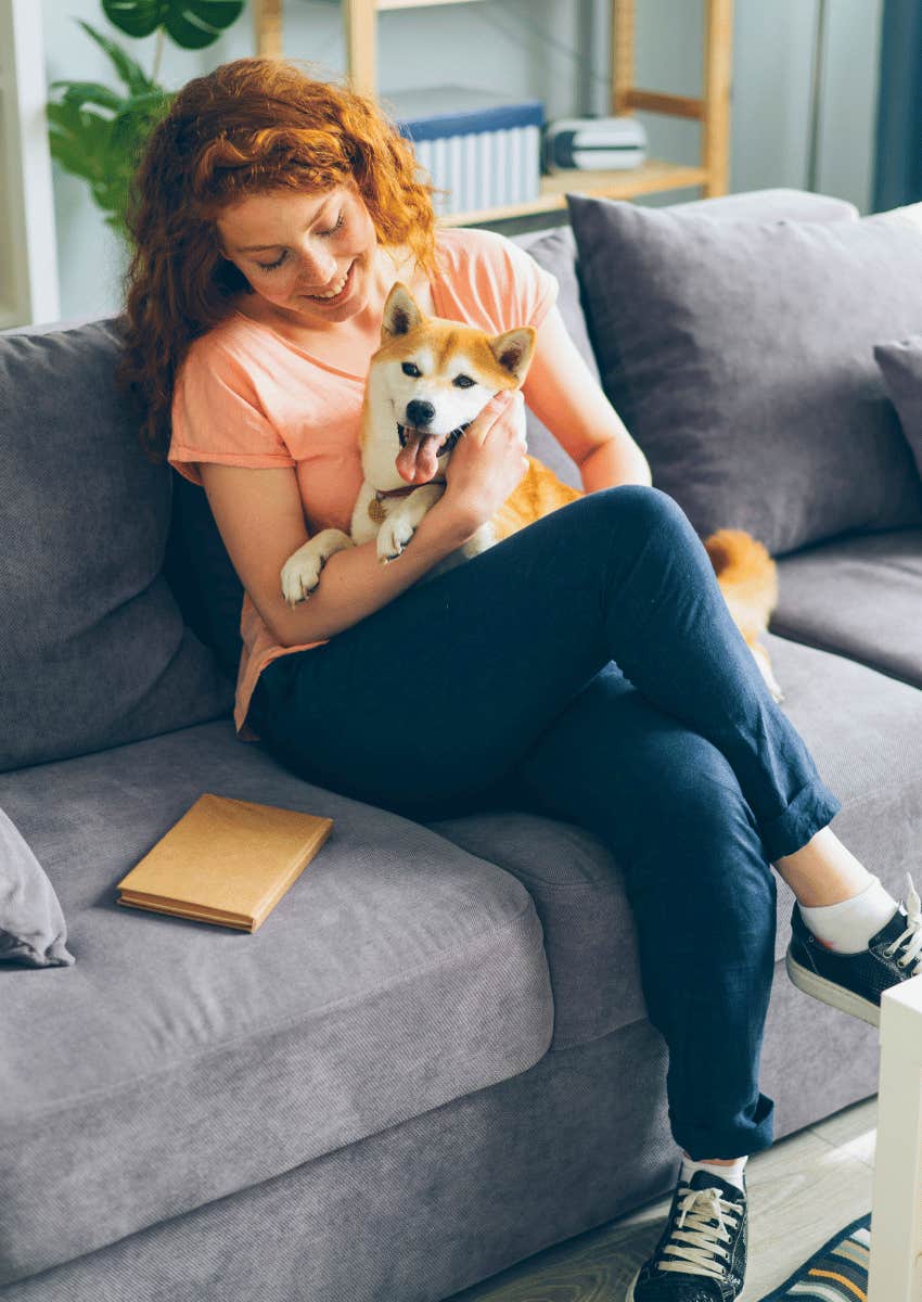 woman with her pet dog embracing her nurturing self