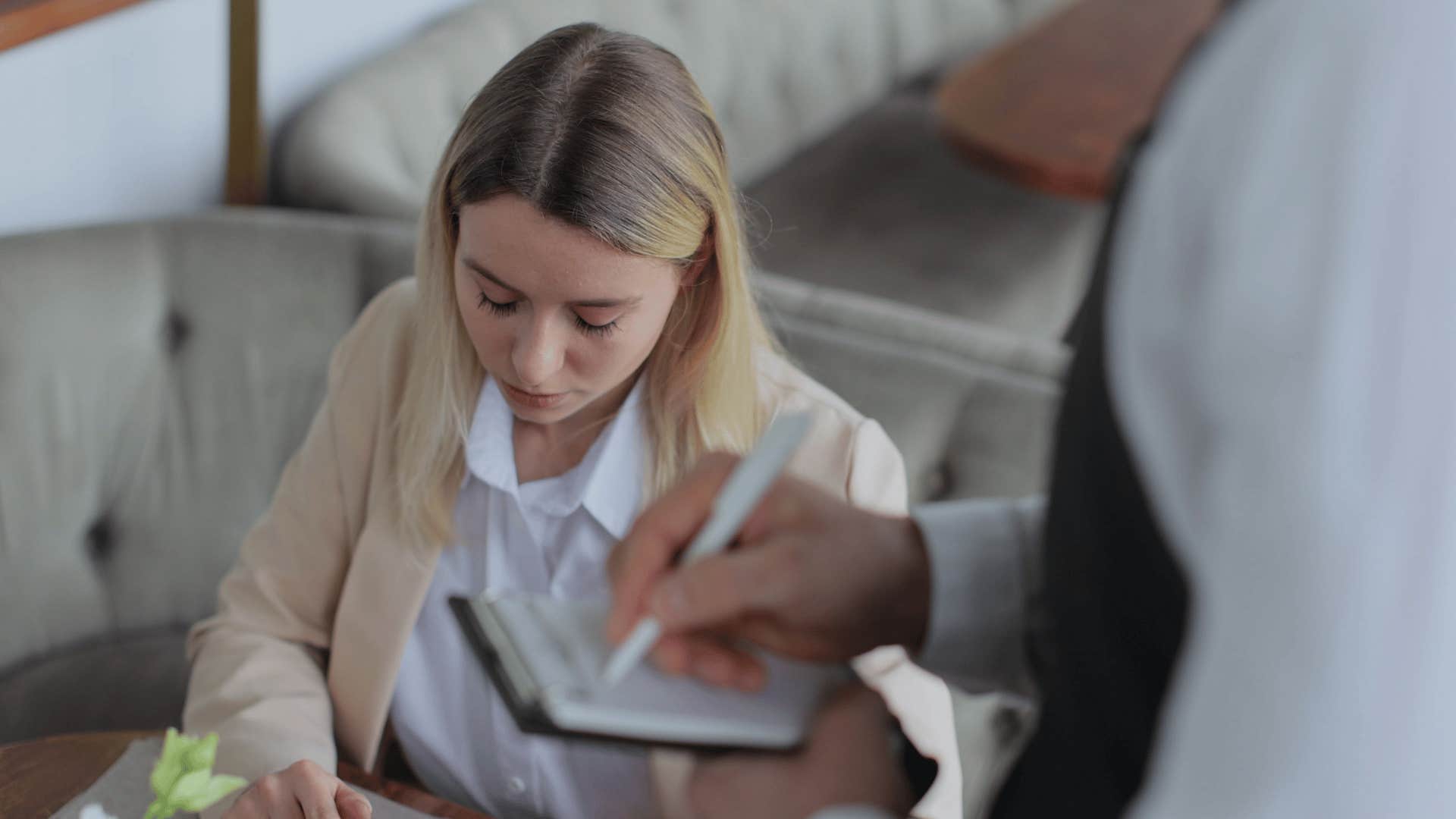 woman who looks high class treating service workers with respect