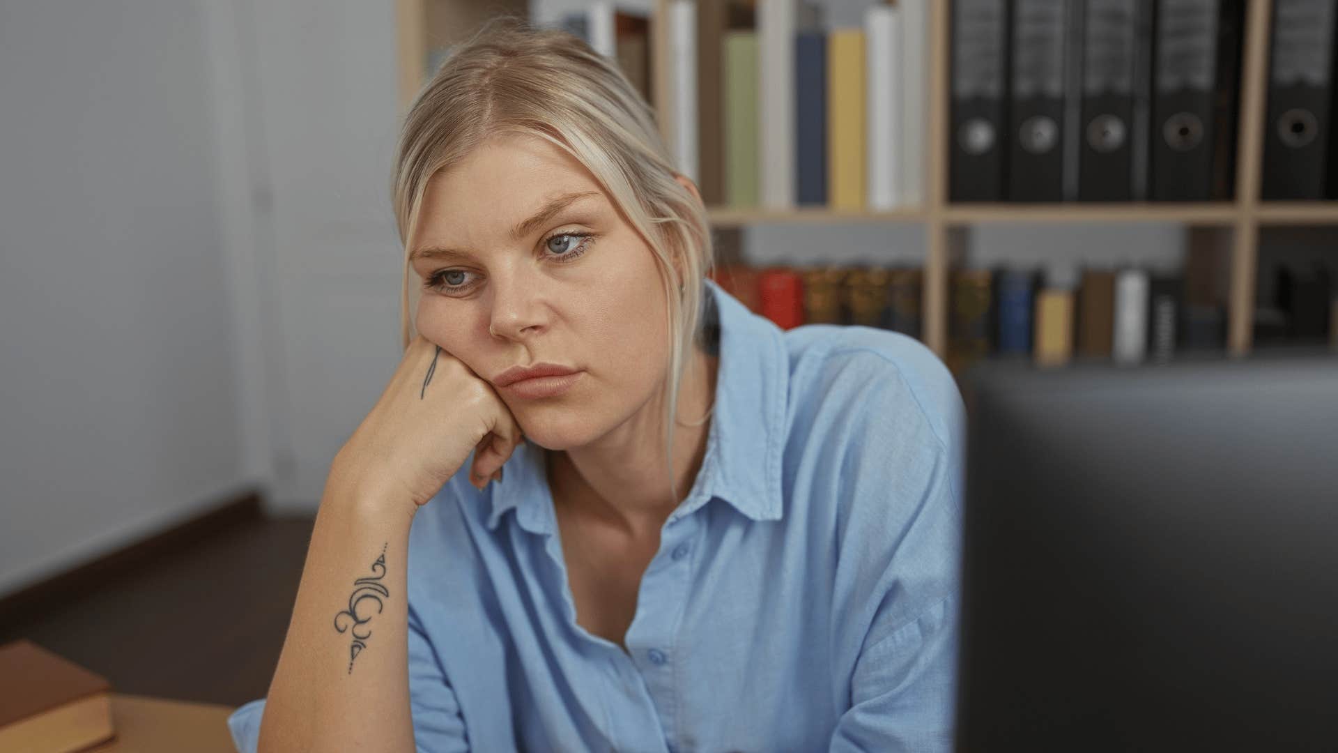 woman who stays emotionally distant because she spends way too much time alone