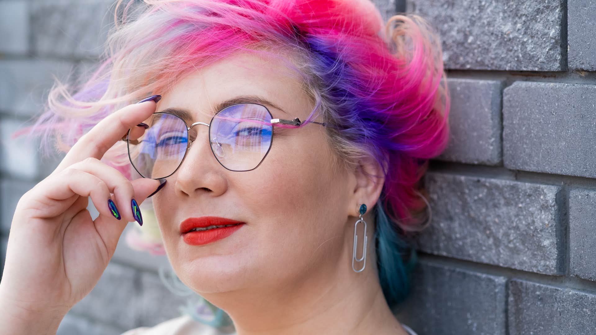 woman who doesn't abide by social norms with colorful hair