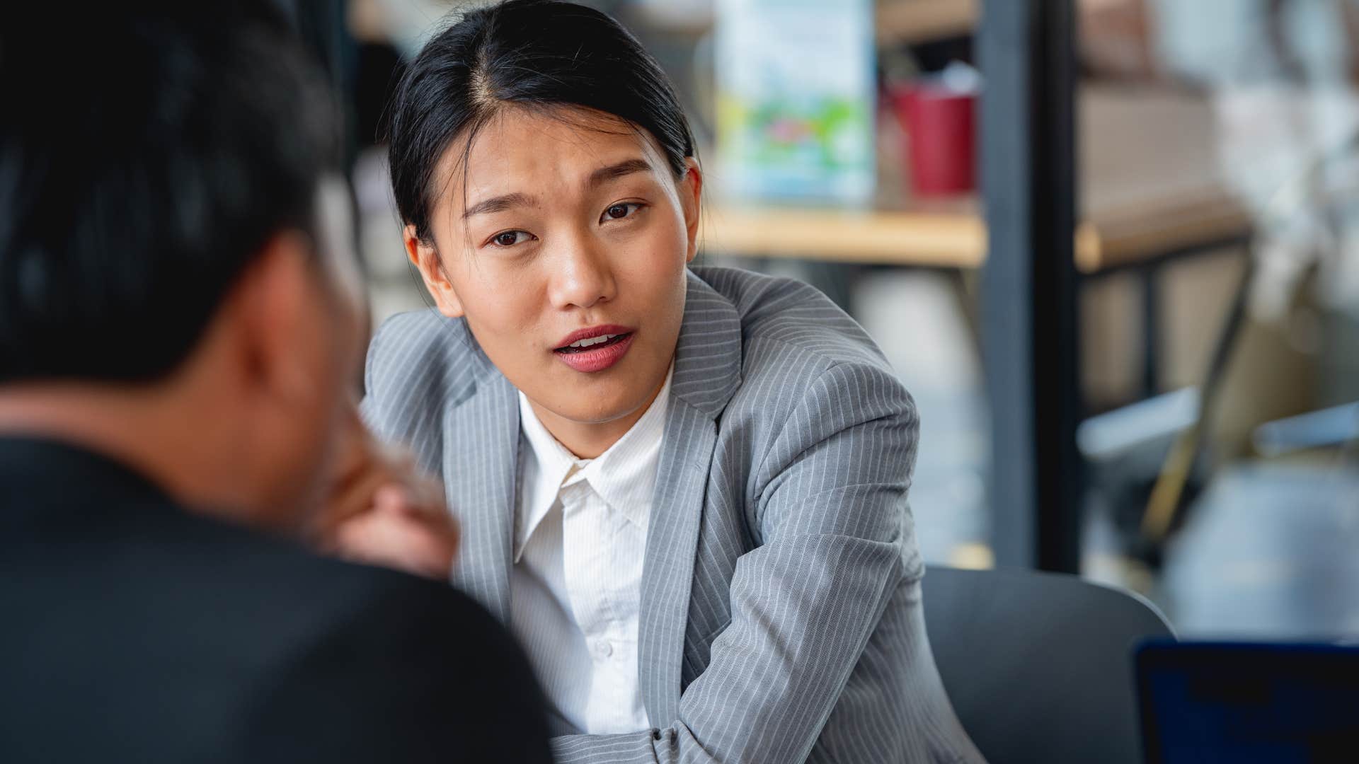 woman who loves peace talking to colleague directly communicating