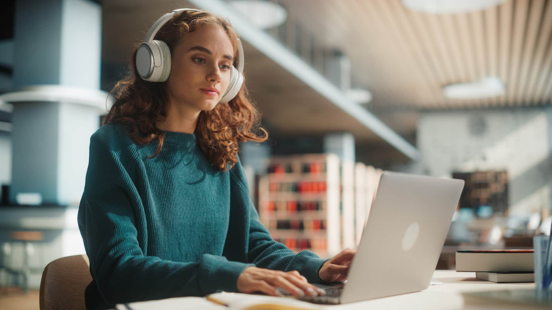 disciplined woman working hard focusing in the library