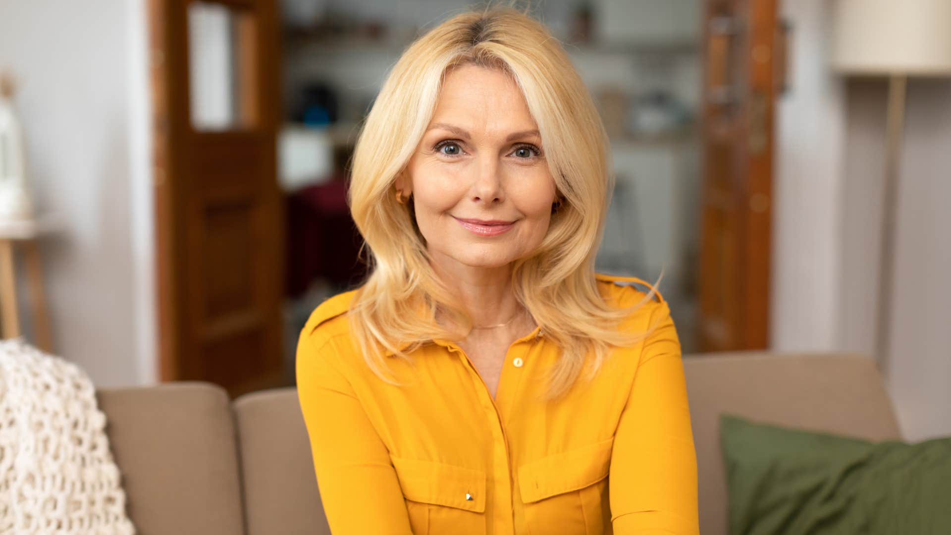 relaxed and emotionally stable woman at home who loves peace