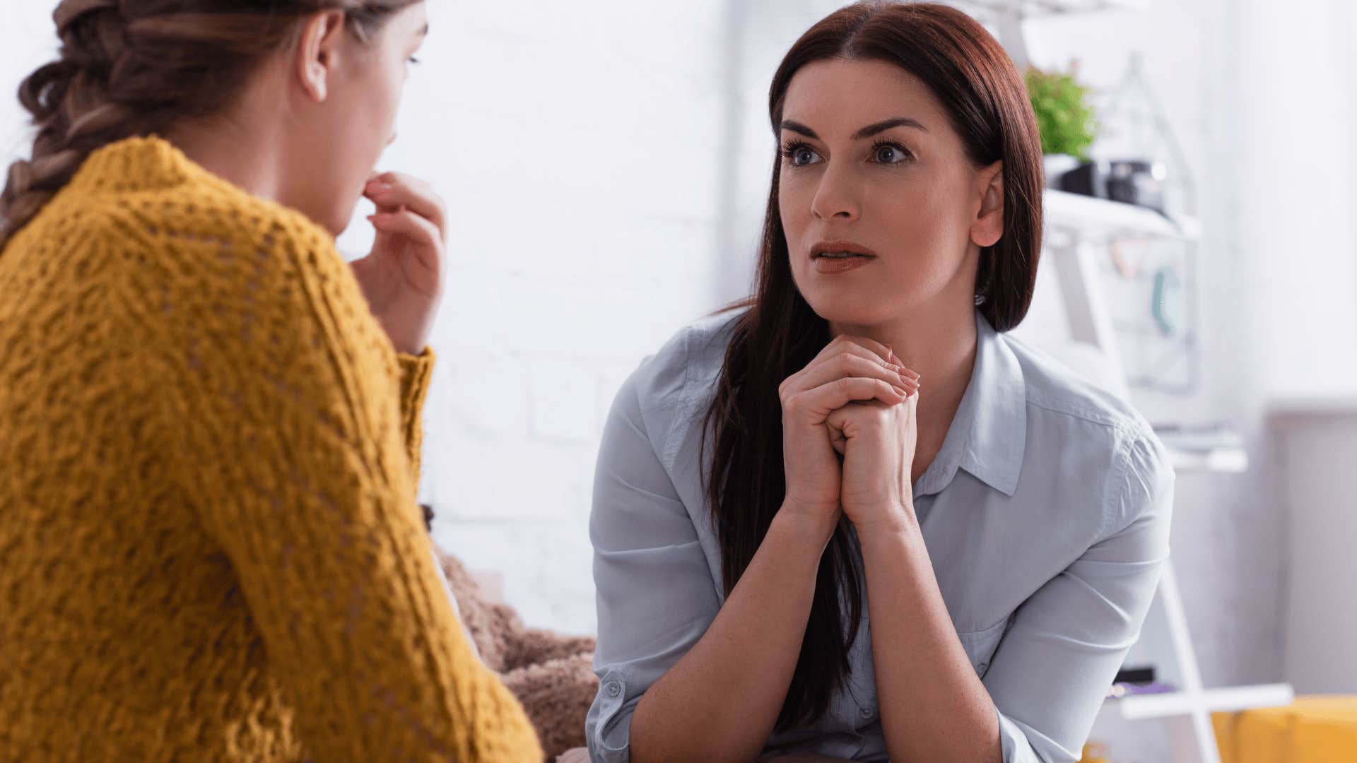 Woman saying she needs a break to her teenage daughter