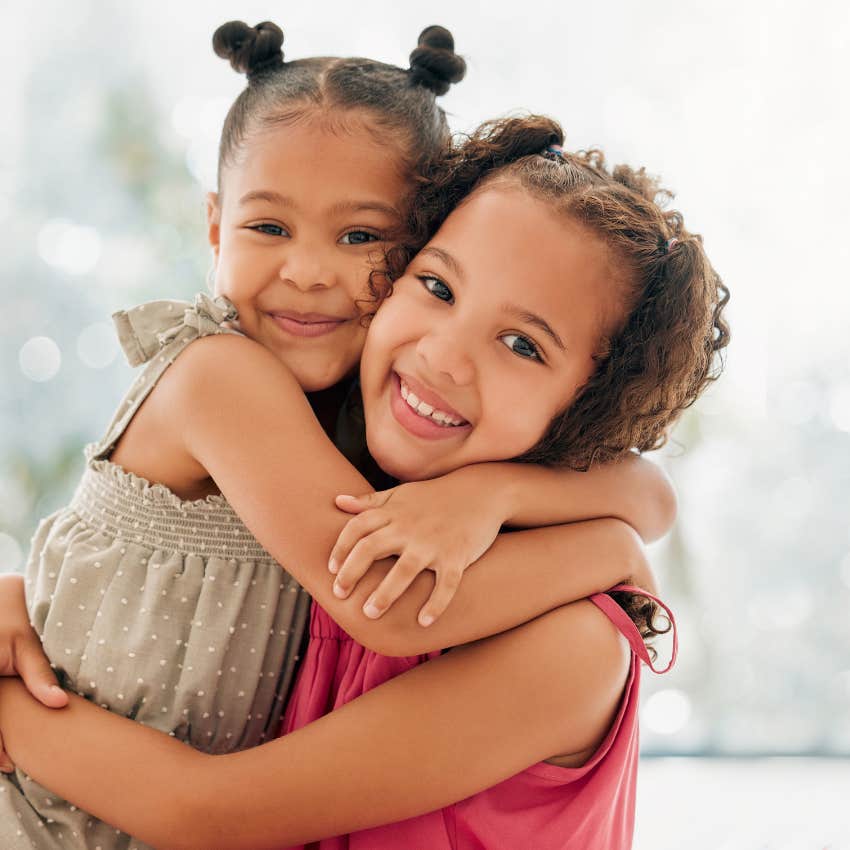 two little girls hugging