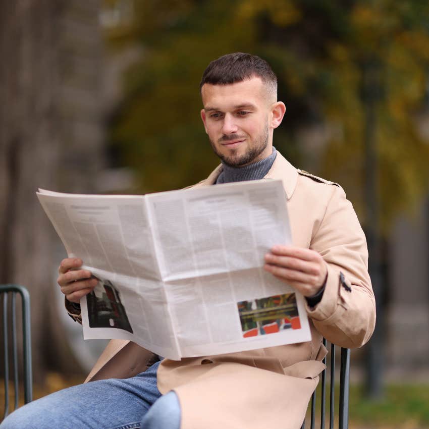 intelligent man reading the news to know what's going on in the world