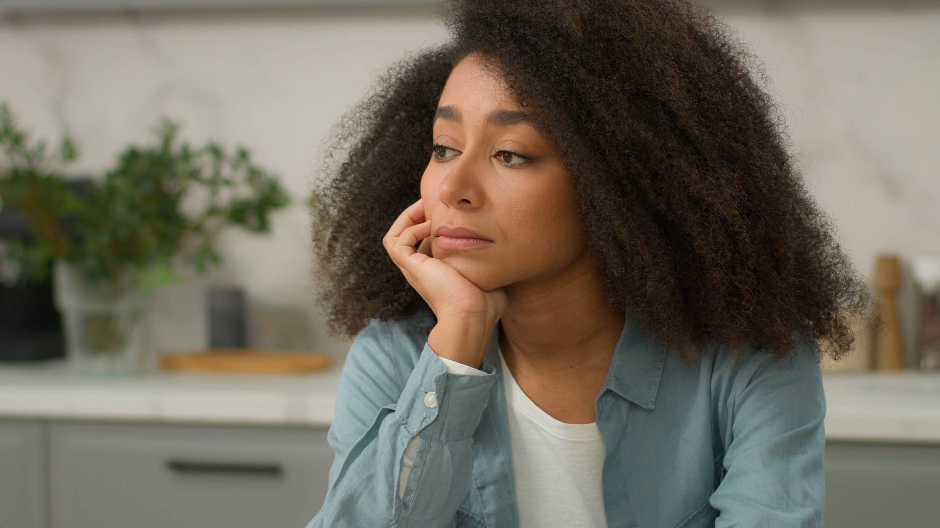 pensive sad woman saying I'd rather just be alone
