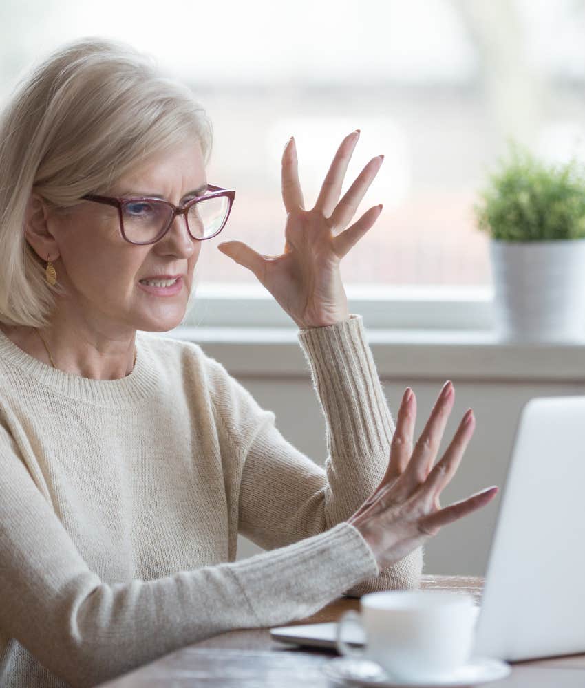 frustrated person at computer showing deleted search history