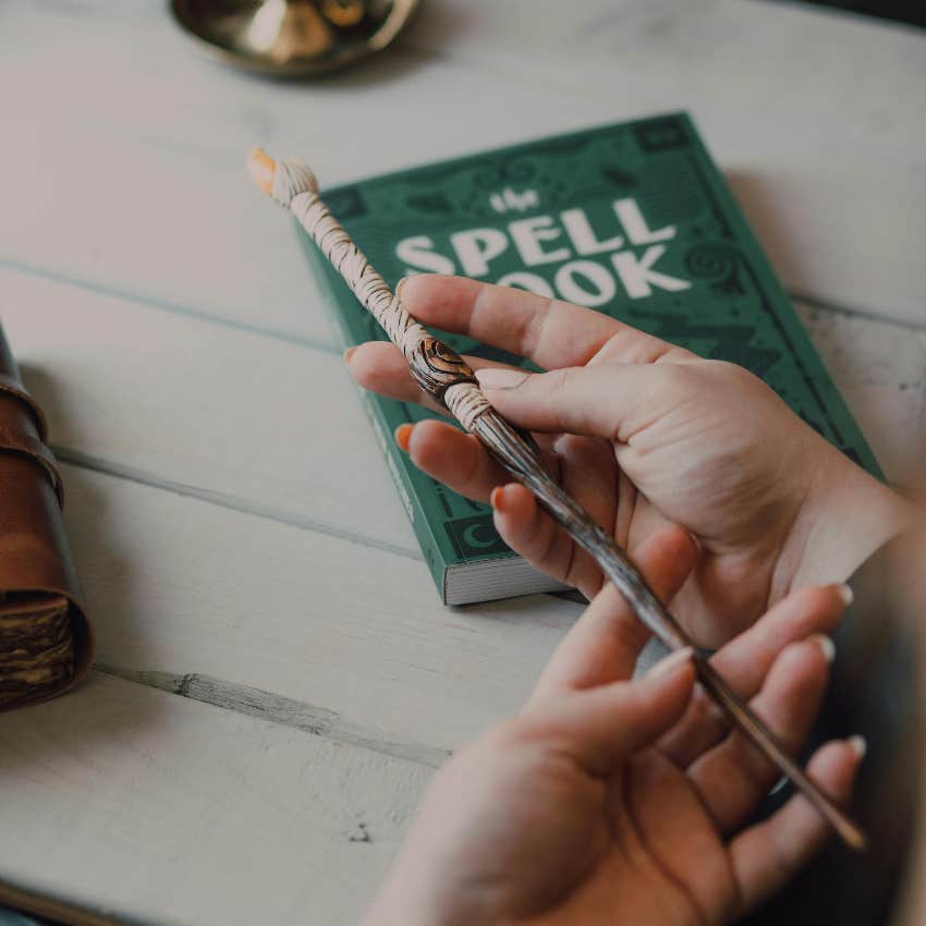 magic wand and book of spells