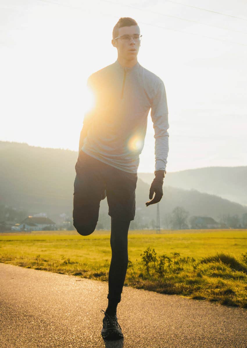 young man stretching before his morning workout