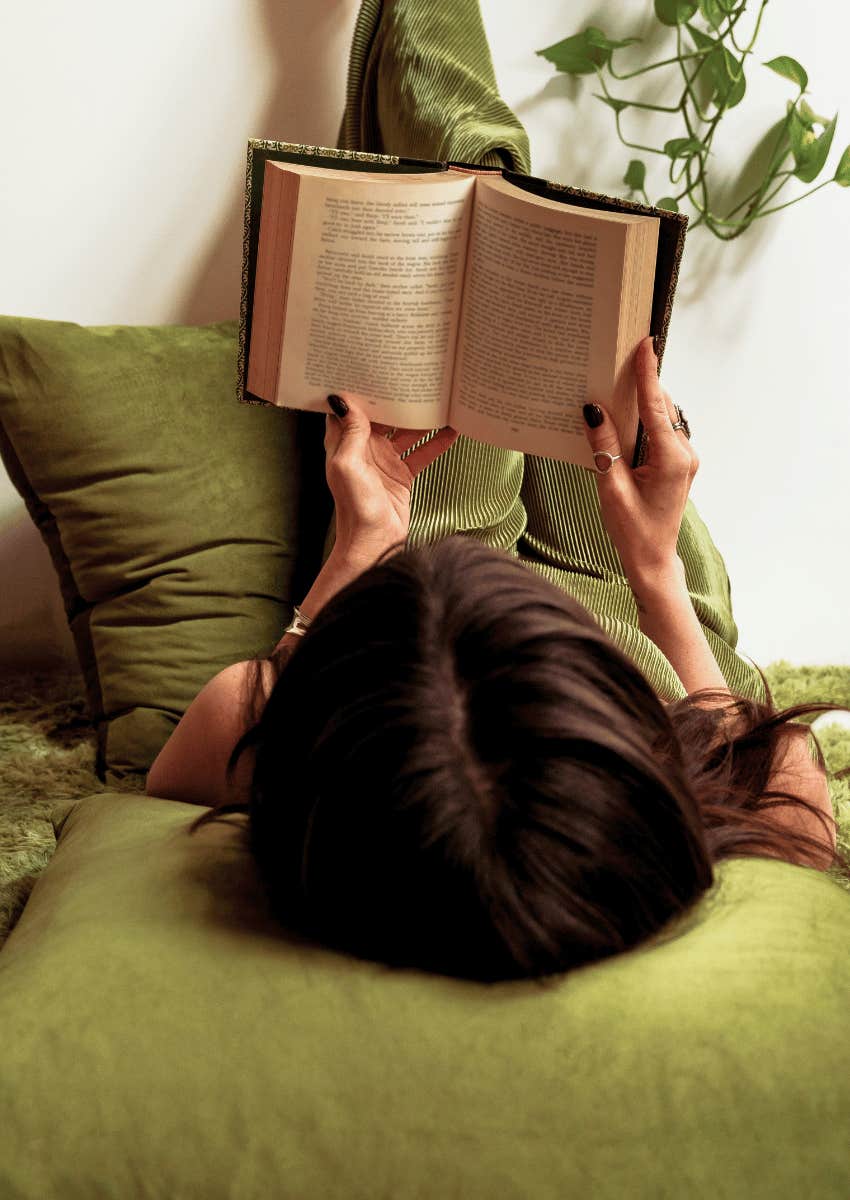 young woman reading a book