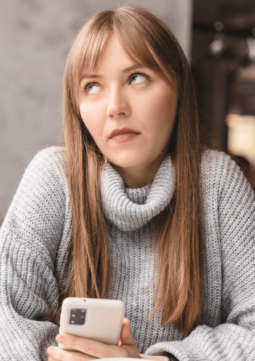 young woman rolling her eyes