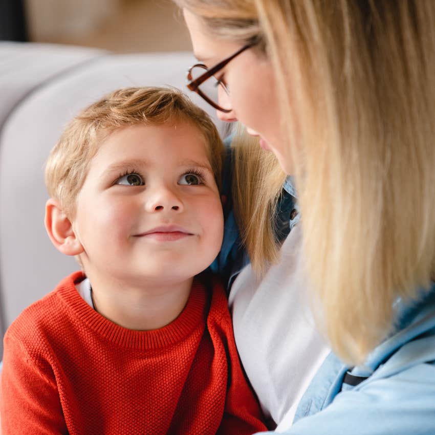 mom telling her smiling son good things come to those who wait