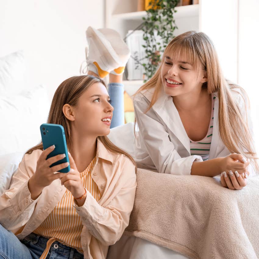 high school students looking at bed party photos on social media