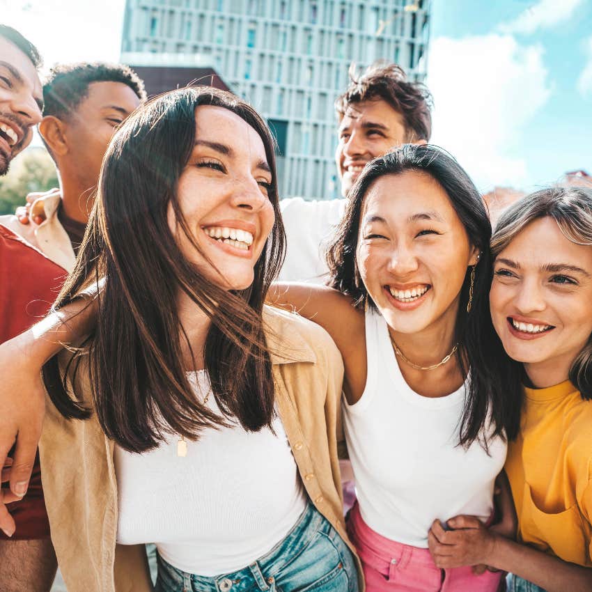 inclusive group of Gen Z friends smiling together