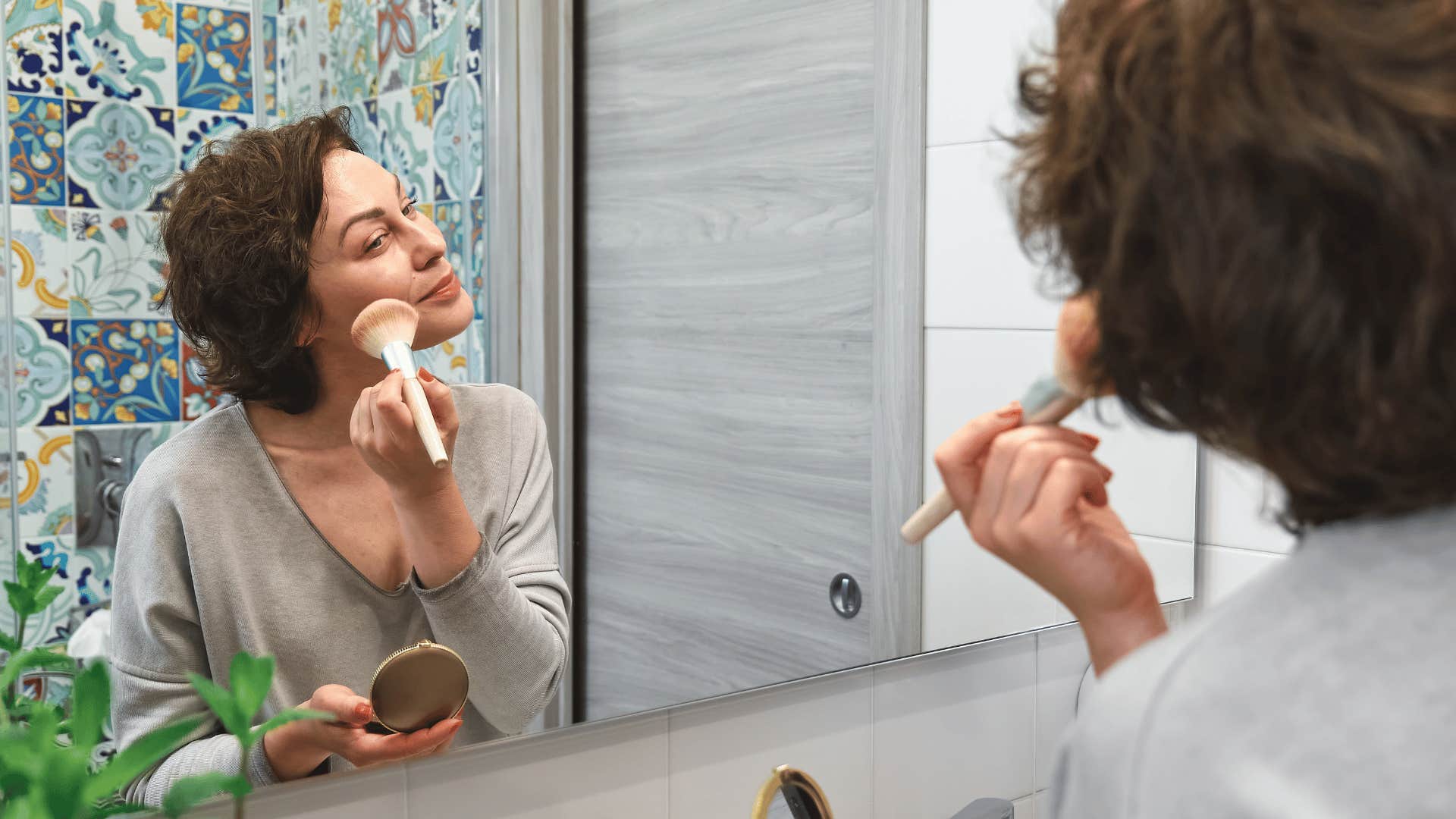 woman who spends her money on high-end beauty products