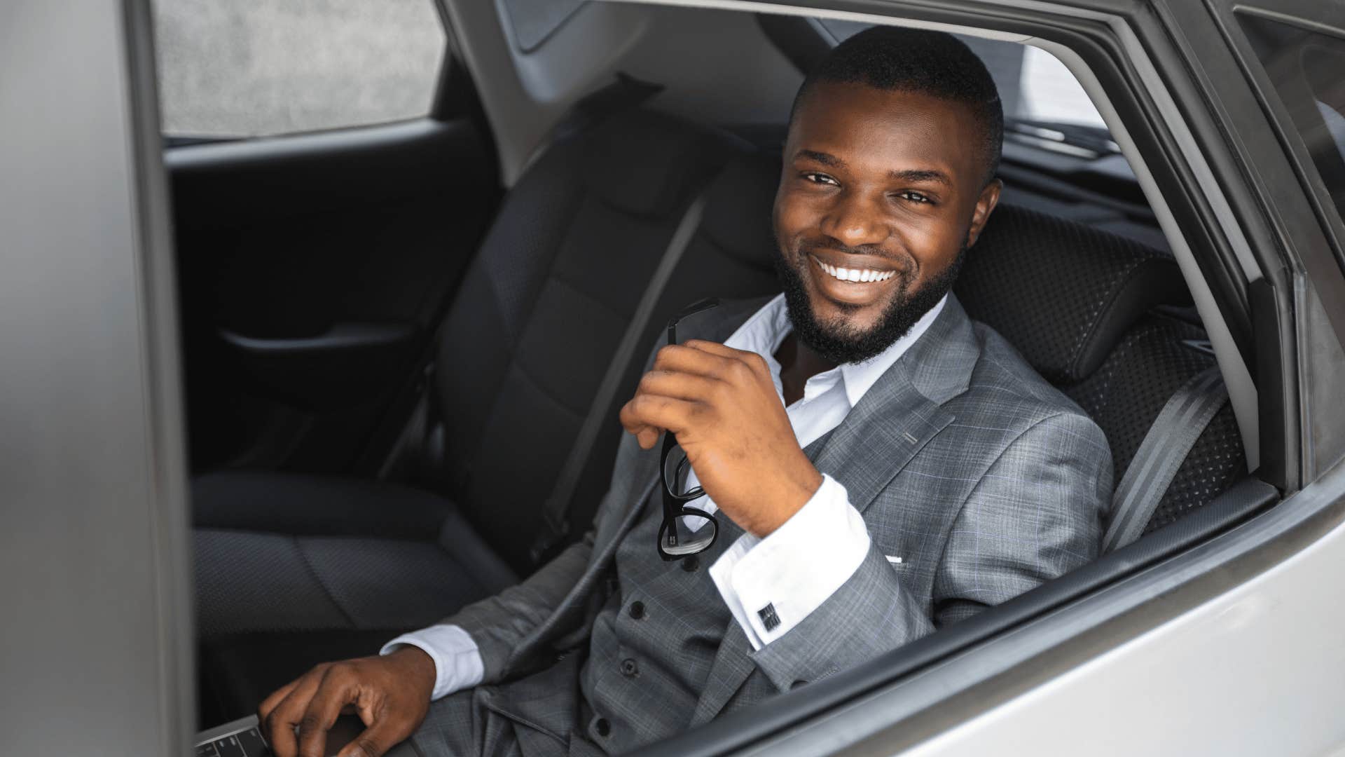 man who spends his money on ride-shares