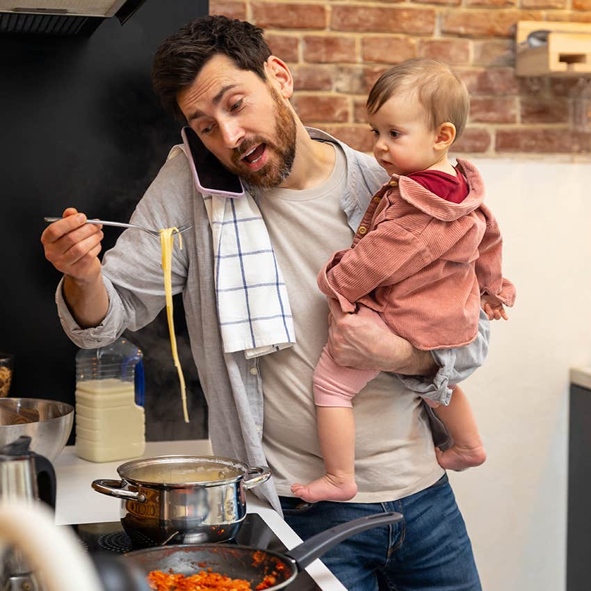 busy man multitasking with baby in hands