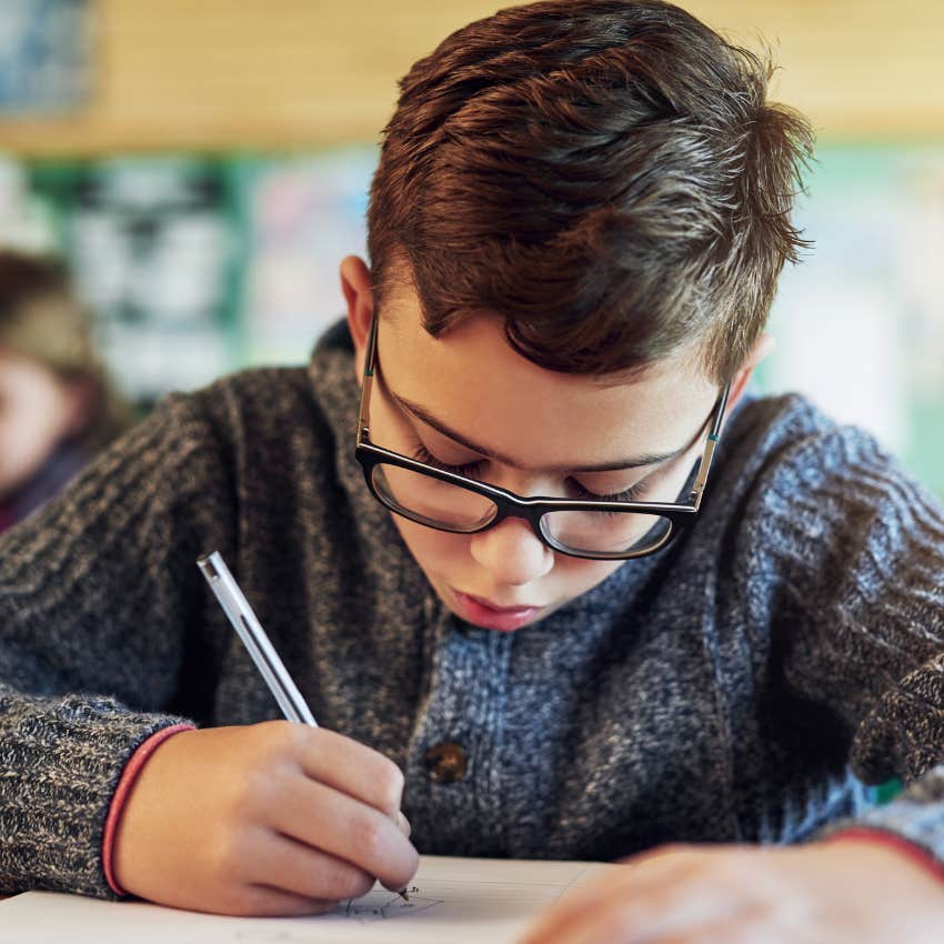child having academic success on his test