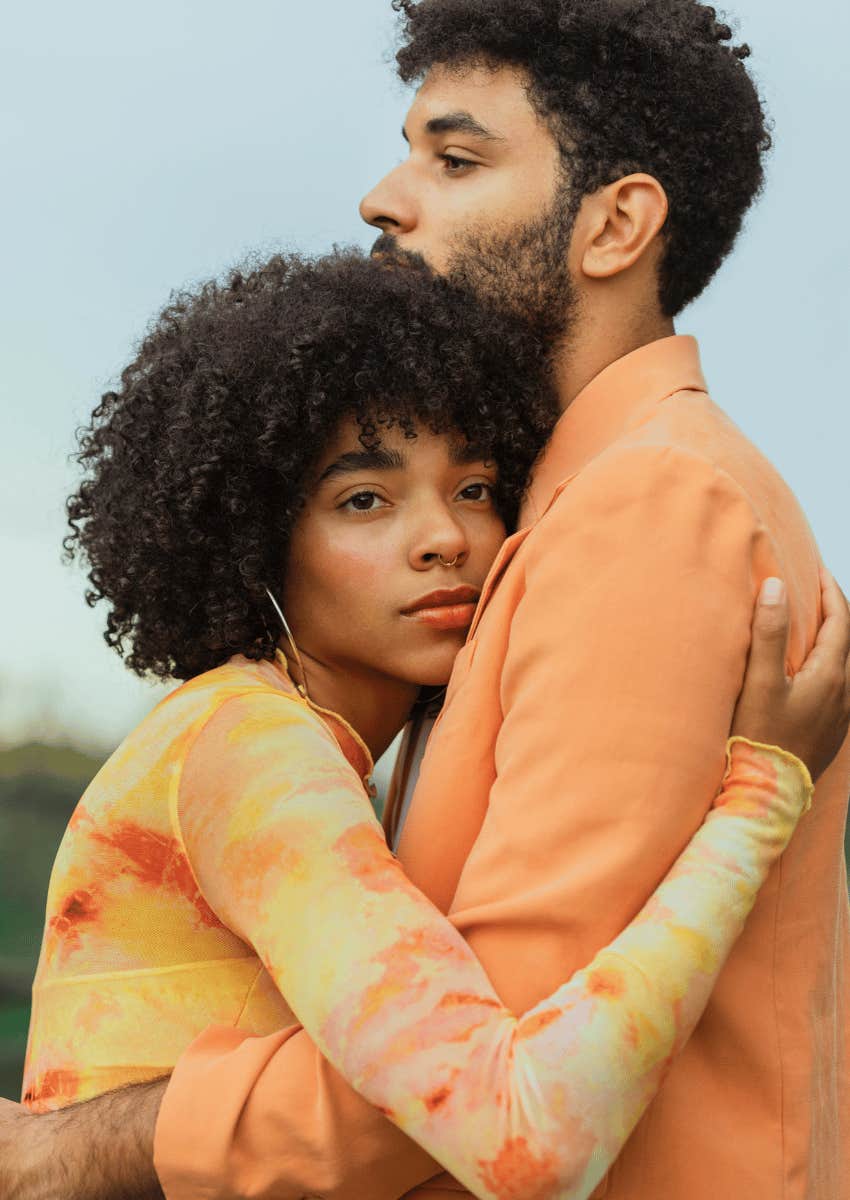 couple hugging emotionless