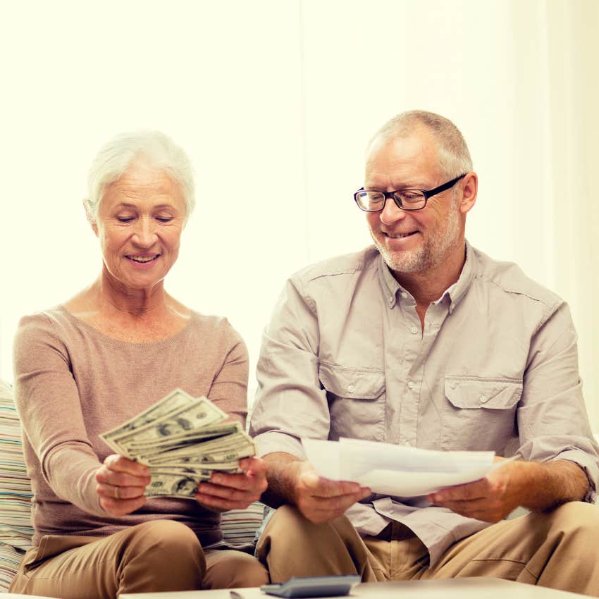 wife with financial independence showing her husband her money