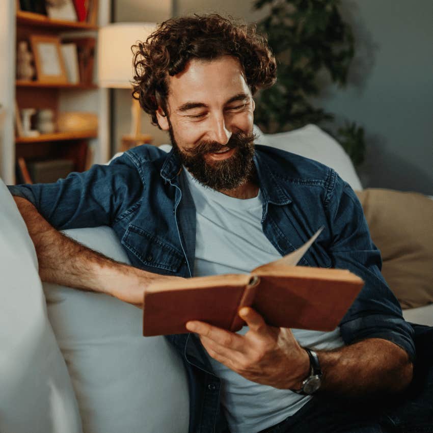 man reading a book focusing on what feels good to him