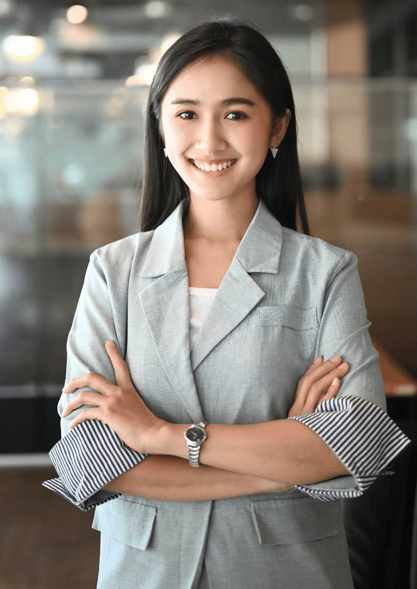 energetic young female employee smiling