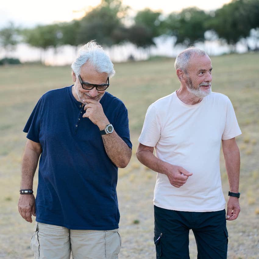 two senior men walking outside following the mantra to think themselves younger