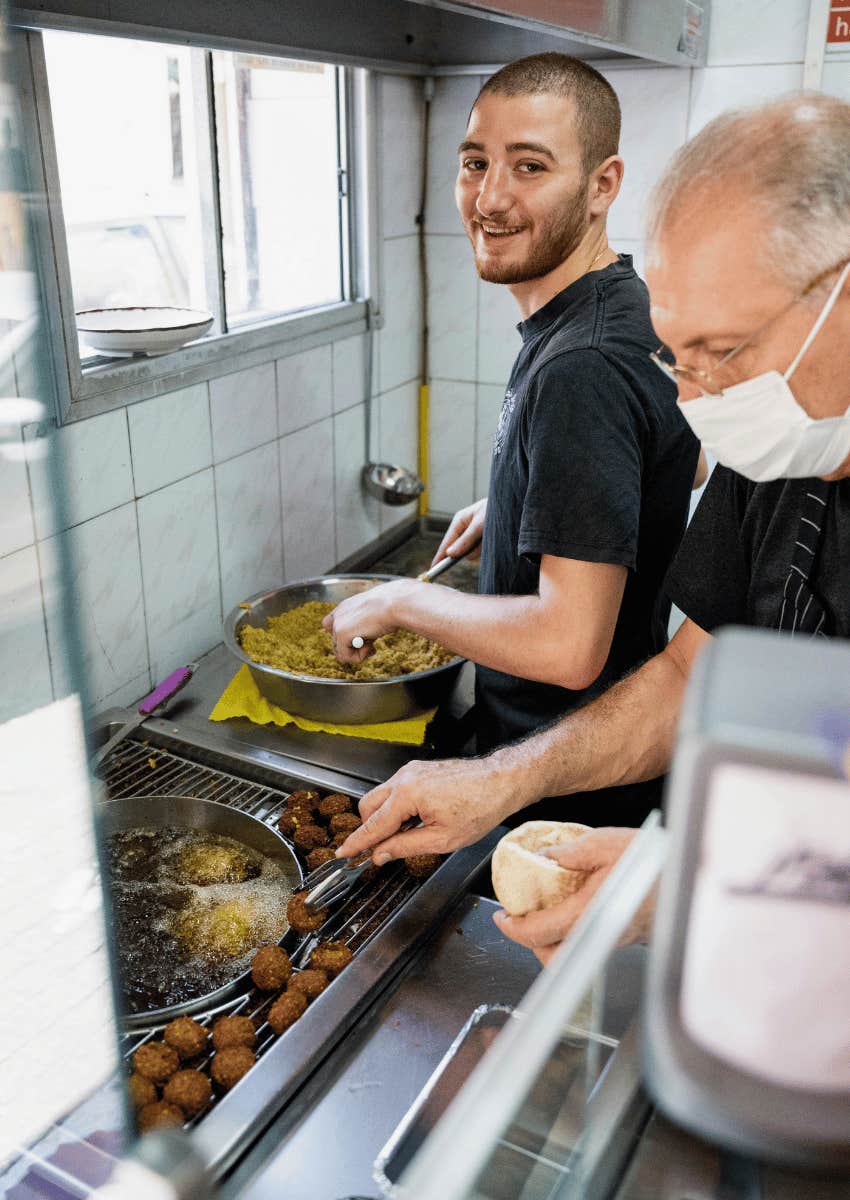 fast food workers using traditional cookware