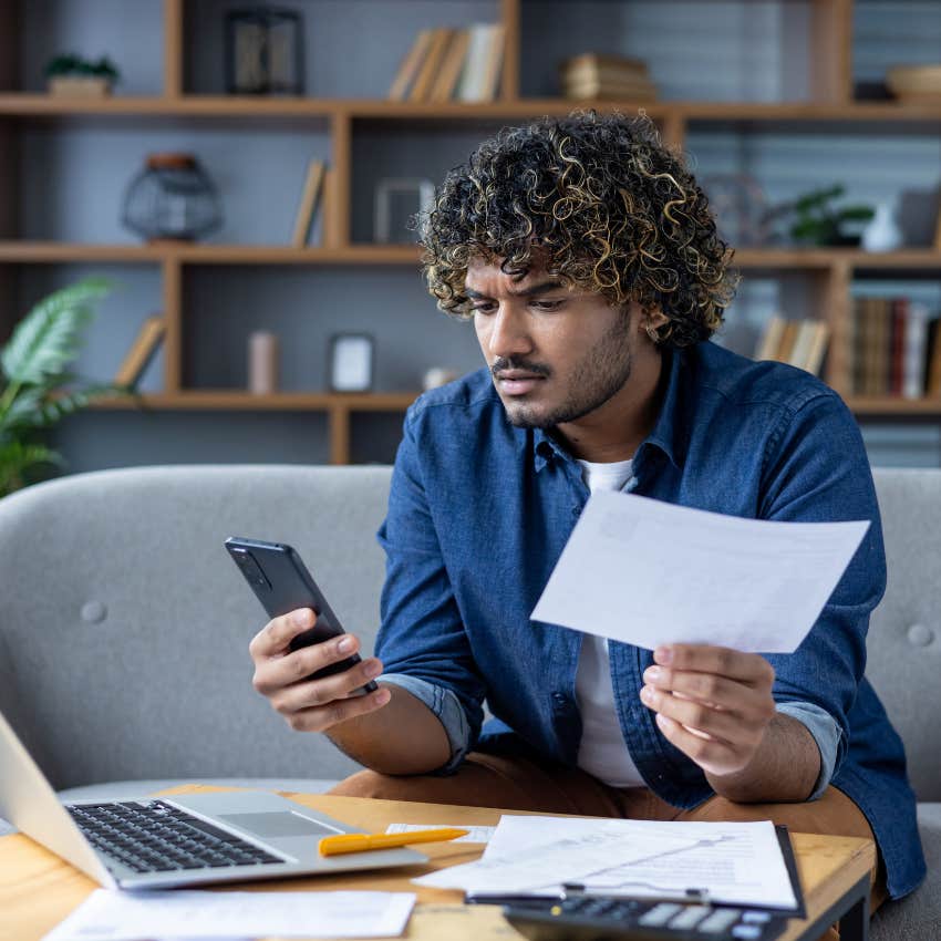 man looking over finances 