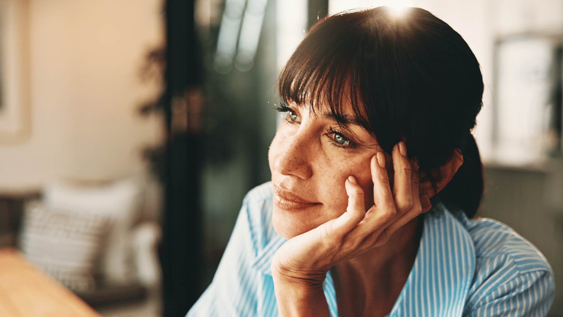 high iq woman seeming lazy while daydreaming