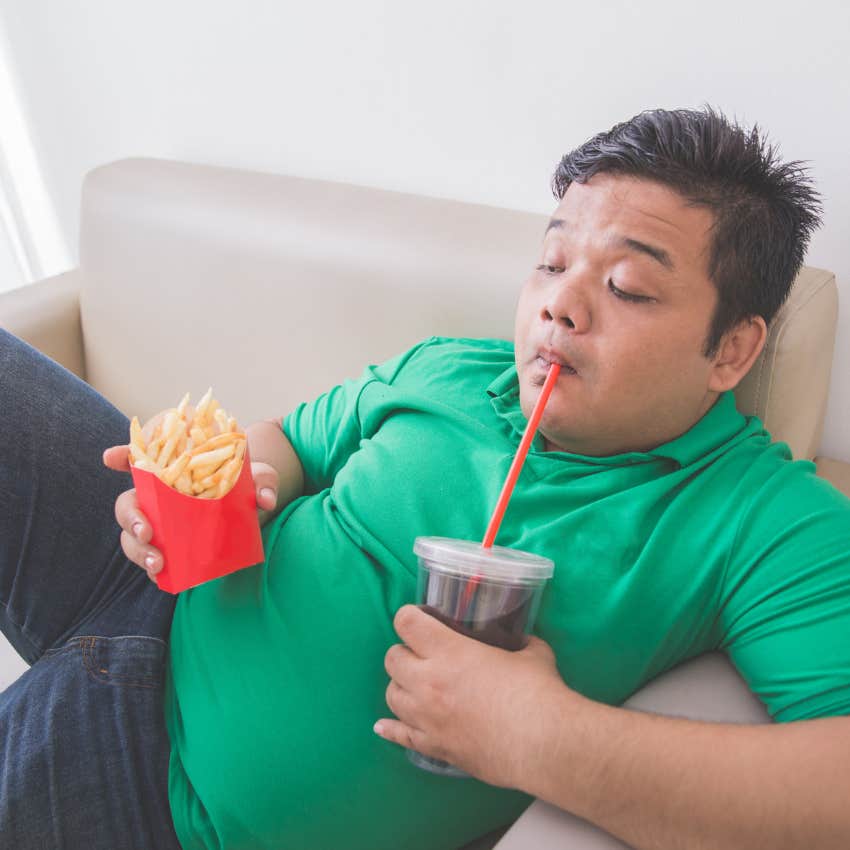 man unable to stop eating unhealthy junk food
