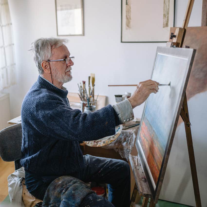 man over 60 pursuing his passions by painting