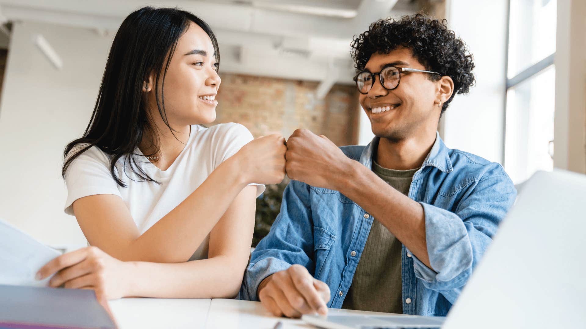 friends congratulating each other on achievements