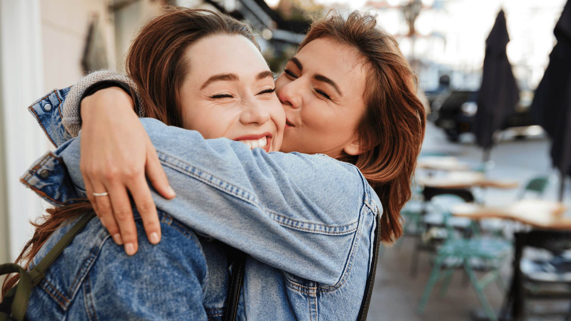 friends hugging outside
