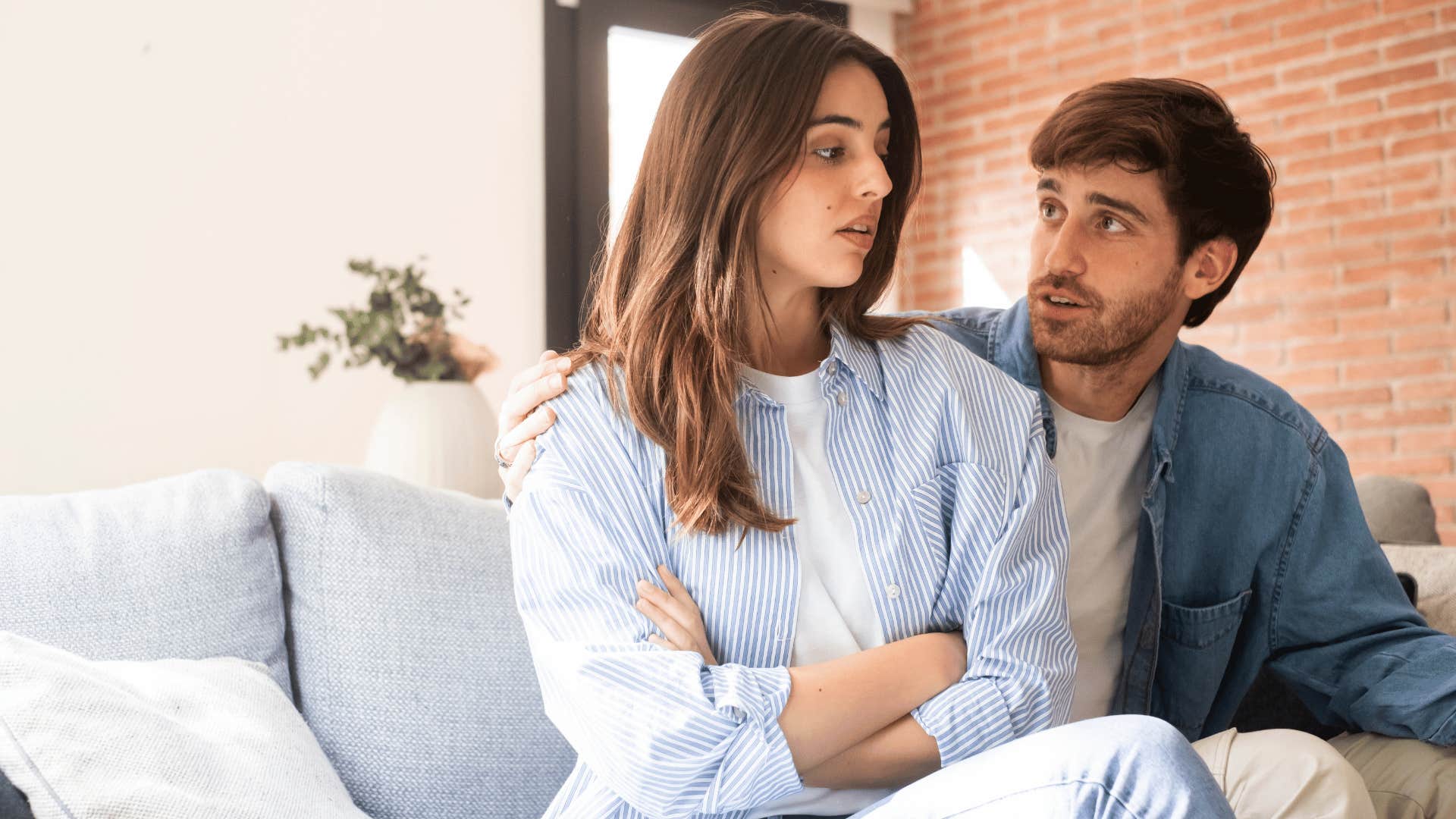 man over apologizing to wife turned away from him