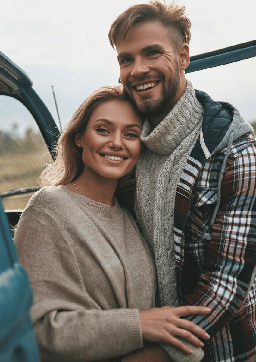 happy couple hugging close and not keeping secrets