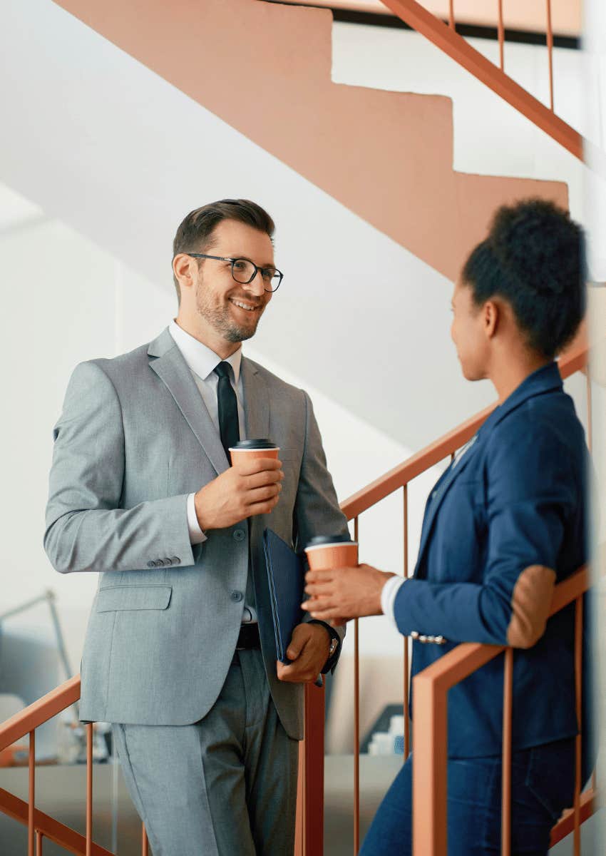 happy coworkers speaking with intention