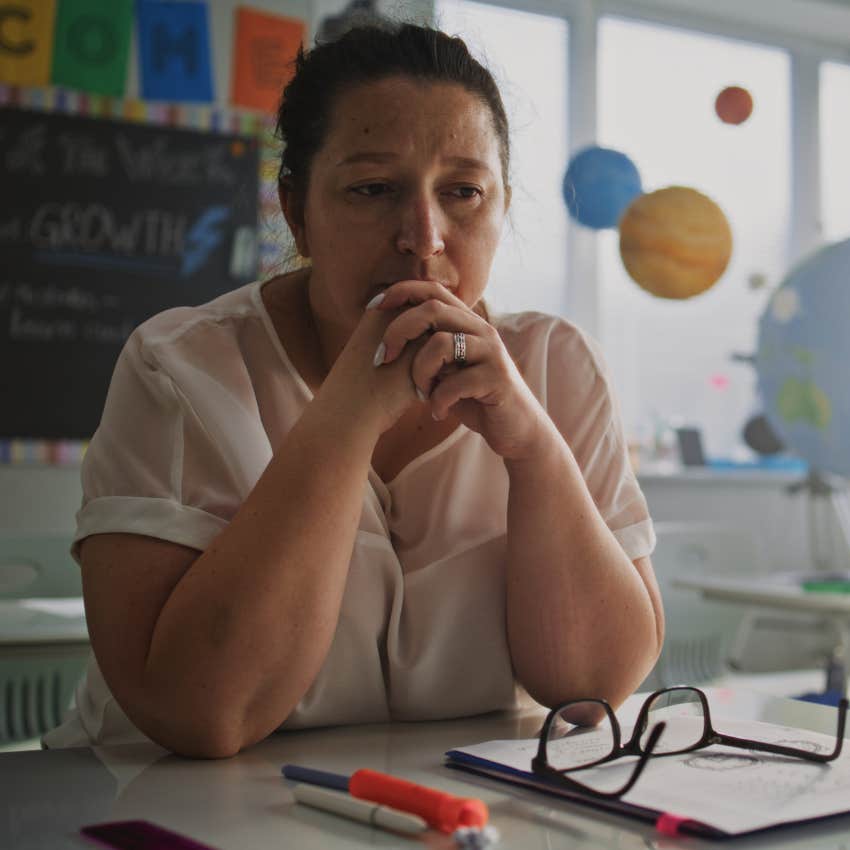 stressed teacher thinking about leaving profession