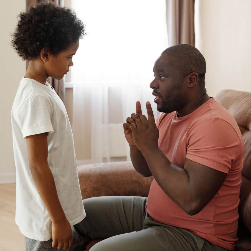 Parent reminding a child about the importance of keeping their word