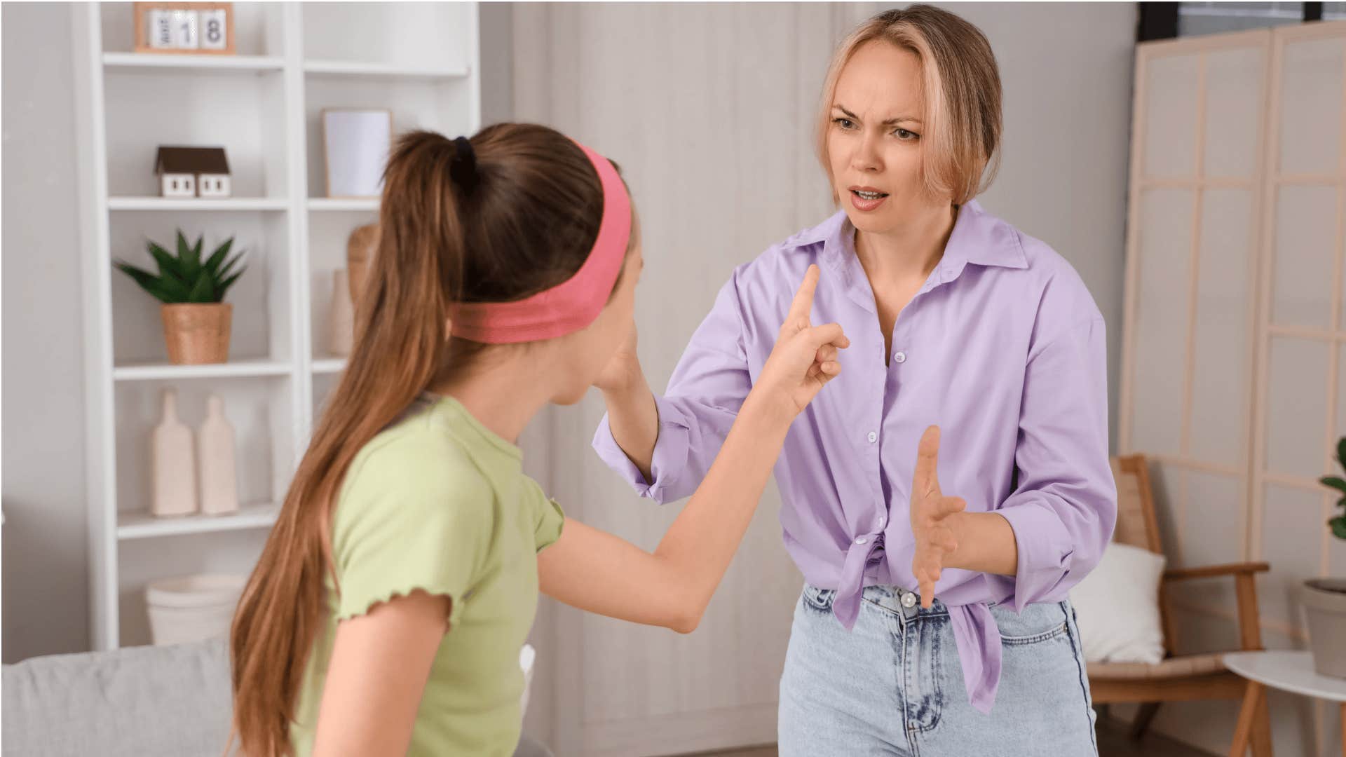mother arguing at her teen daughter who is trying to negotiate