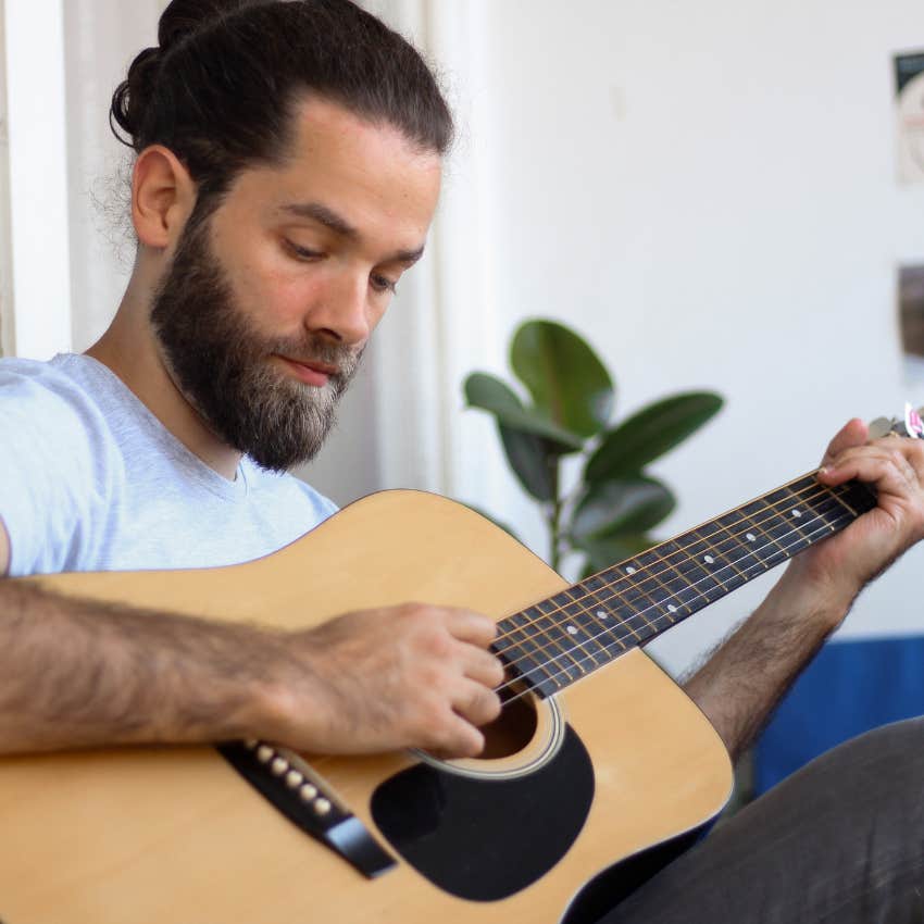 man who feels most relaxed playing guitar because his job requires a lot of thinking