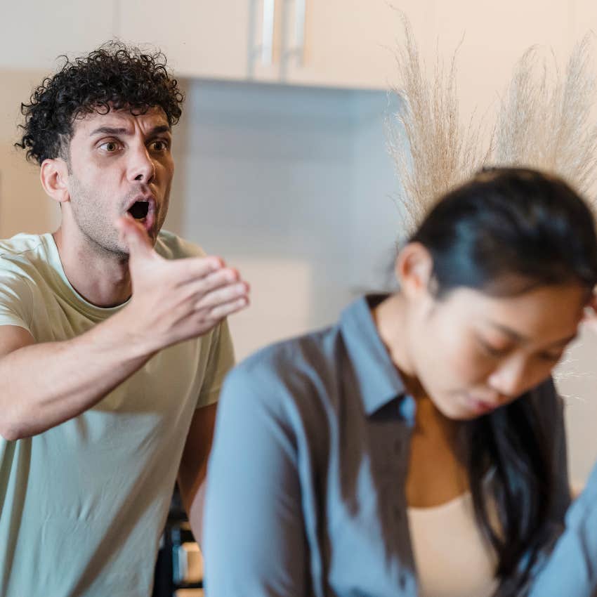 man with poor conflict resolution skills yelling at his girlfriend