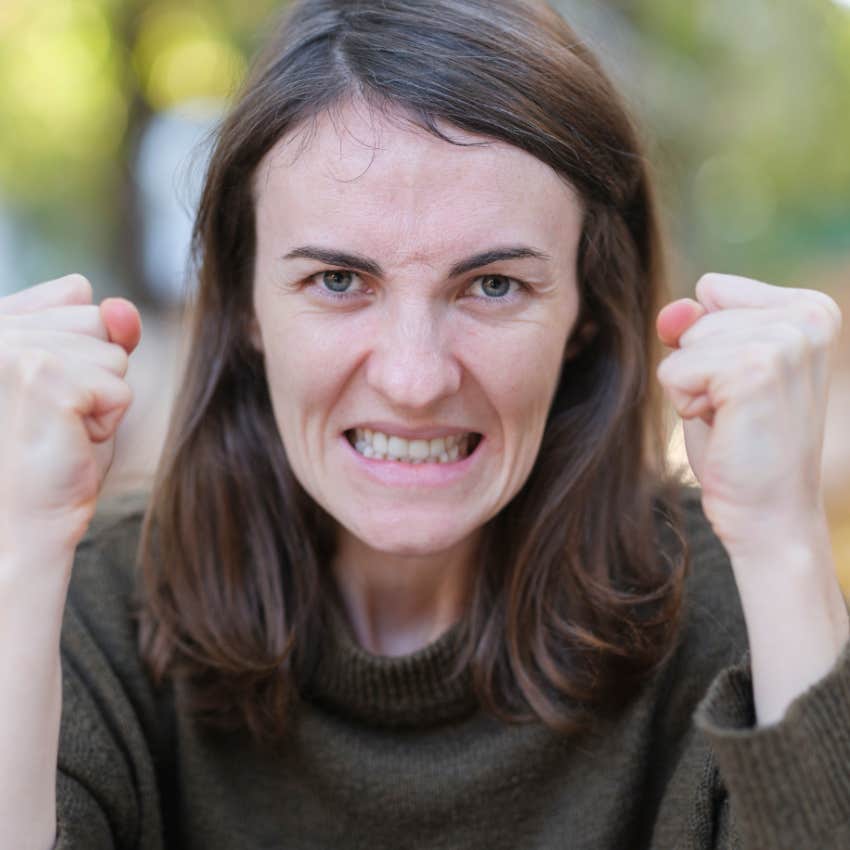 woman showing she's mad through body language 