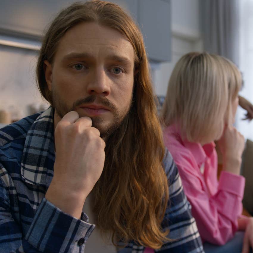 introverted man looking upset during large group activities