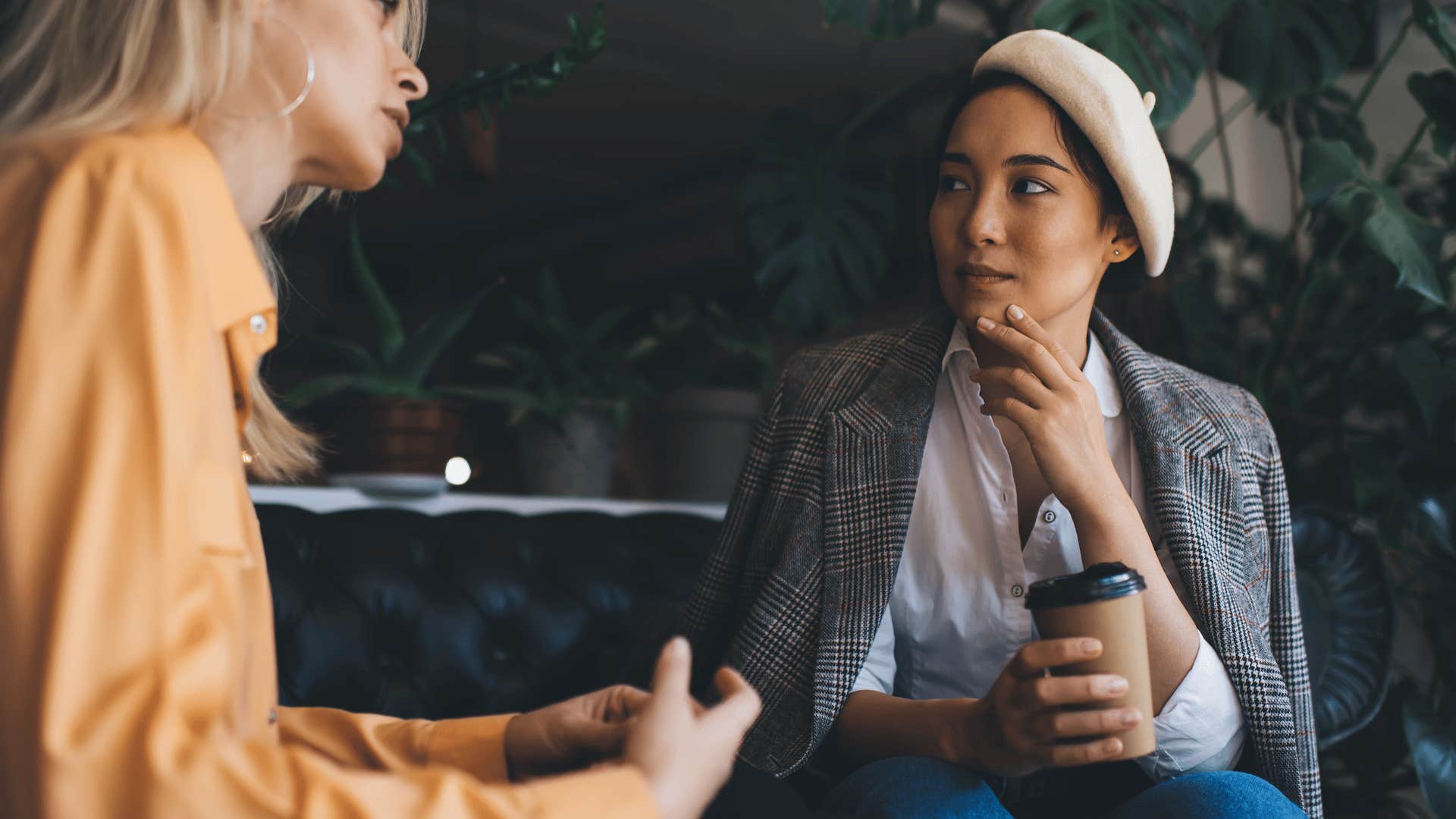 kind woman thinking deeply forming boundaries with colleague