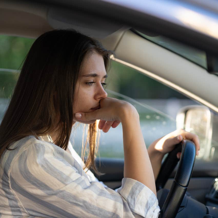 Gen Z woman dealing with mental health issues in her car
